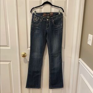 Blue Boot Cut Jeans with Stretch and Faded Details